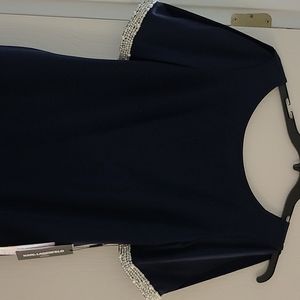 Formal Navy blue dress. Has beautiful sequins on split sleeves. Brand new
